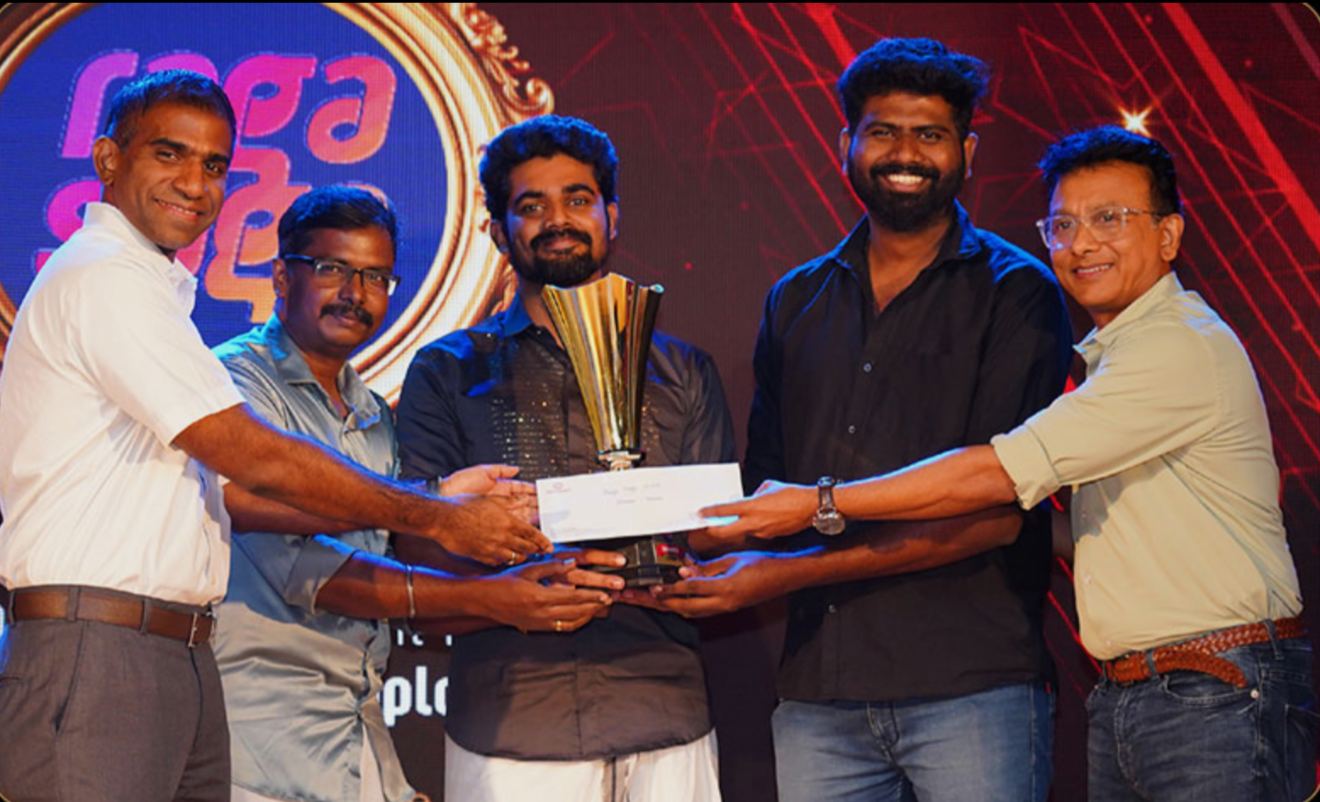 Receiving the Raga Saga 2025 trophy