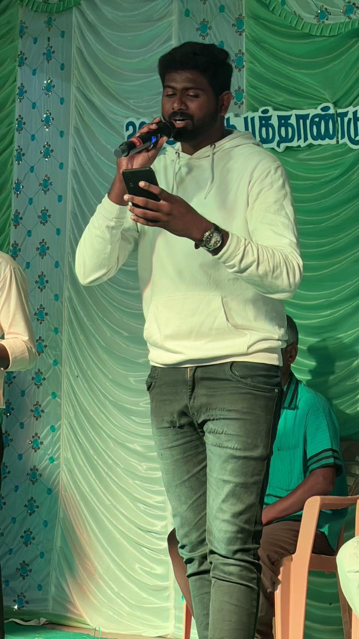 Performing live on stage with a microphone